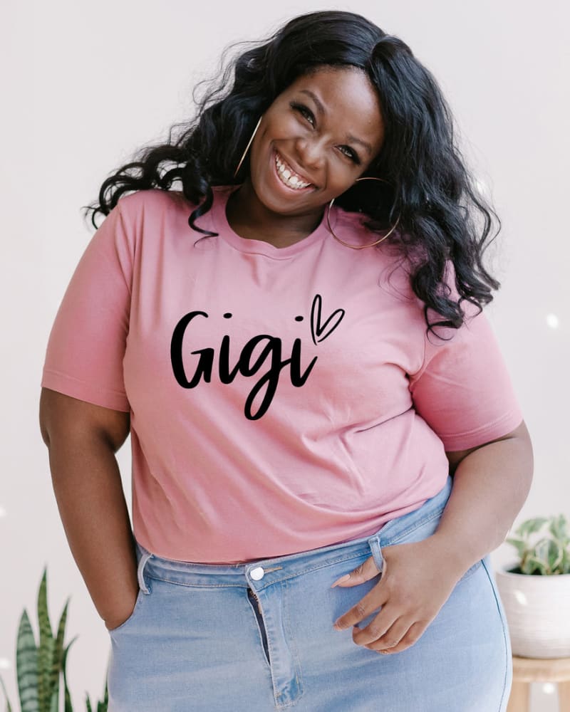 Front of a model wearing a size XL Gigi Heart Short Sleeve Graphic Tee in Mauve by Simply Sage Market. | dia_product_style_image_id:290738